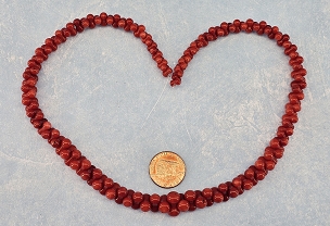 Vintage Graduated Coral Peanut Shaped Bead Strand