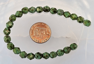Strand of 25 Teal Green Picasso Faceted Fire Polish Beads