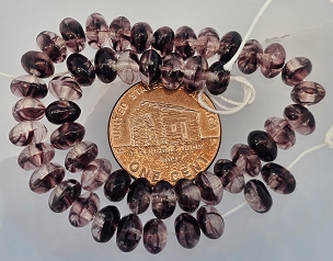Strand of 50 Rounded Triangle Czech Beads